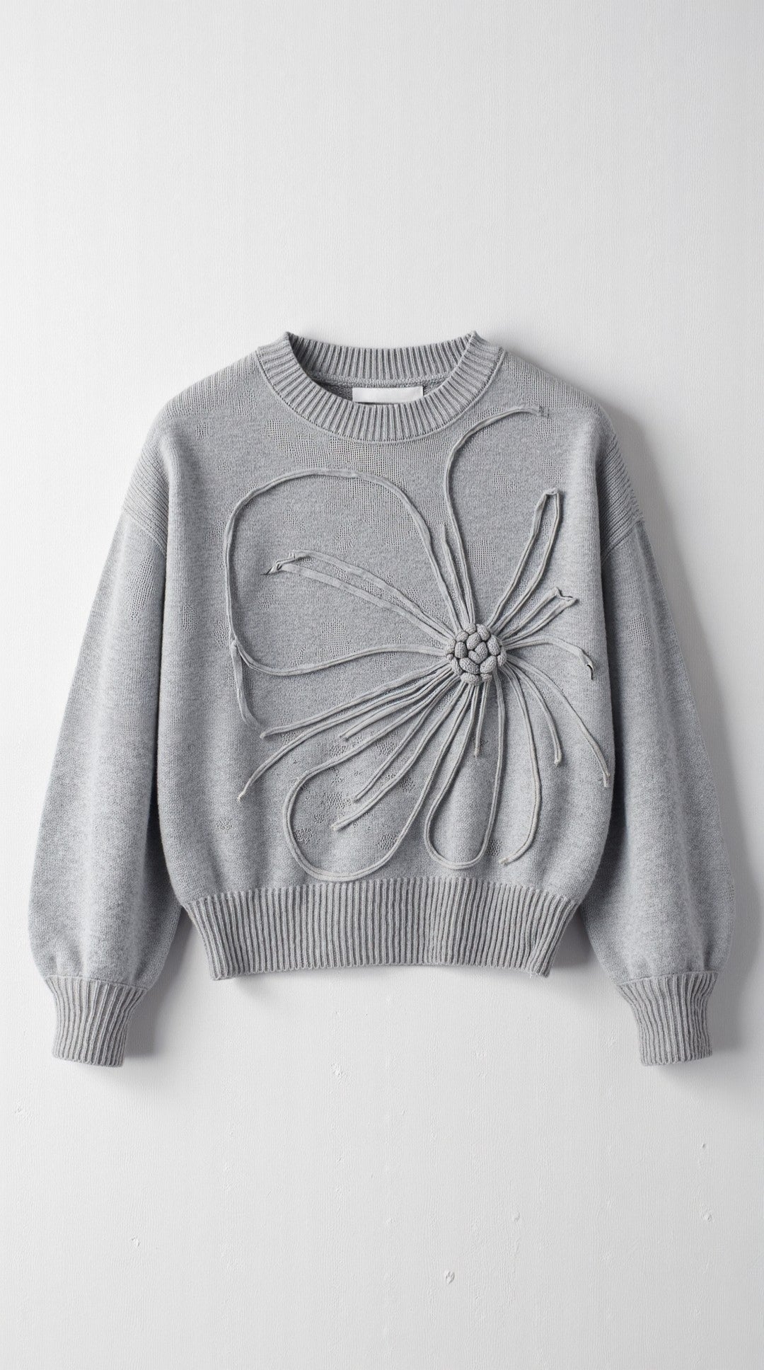 Suéter de punto con diseño floral